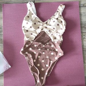 Never worn cute one piece!